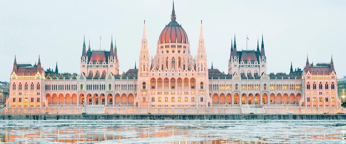 Budapest's Parliament Building on the banks of the Danube river in winter